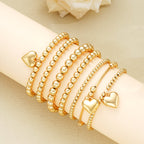 7pc Gold Beaded Heart Charm Bracelet Set