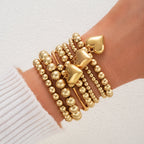7pc Gold Beaded Heart Charm Bracelet Set